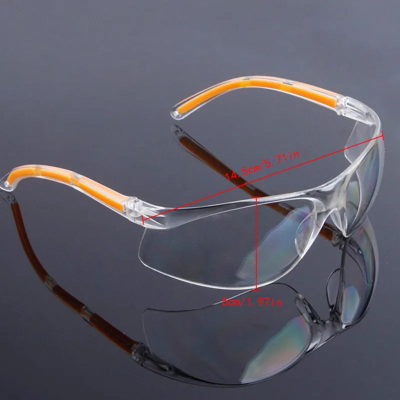 Transparent polycarbonate safety goggles with yellow tint lenses for laboratory and welding work
