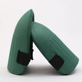 A pair of black EVA foam knee pads for gardening, showing their size and simple design.