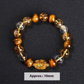 Yellow tiger's eye and citrine stone bracelet with Pi Xiu charm and 10mm geometric beads