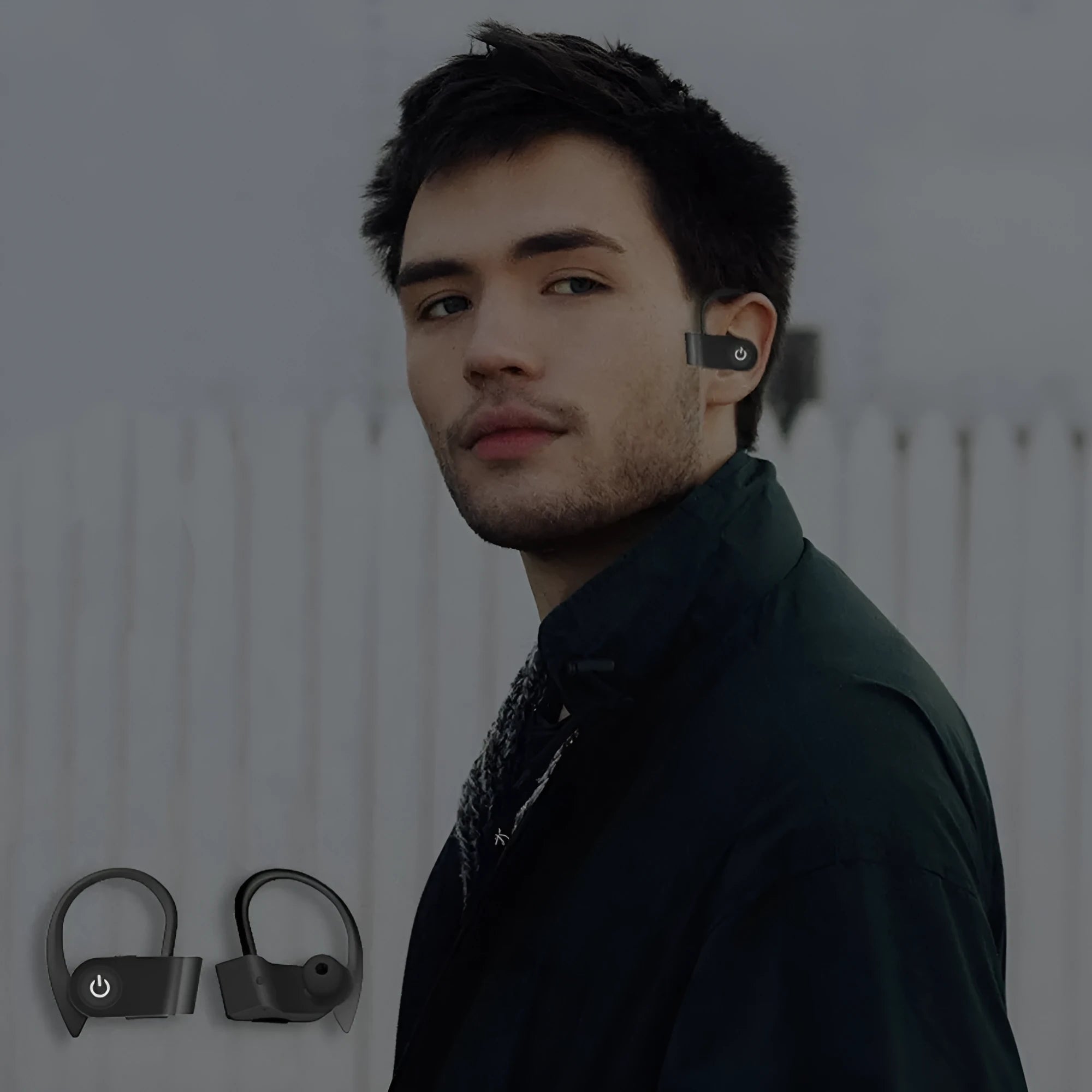 Black wireless Bluetooth earphones with ergonomic design and LED charging indicator.