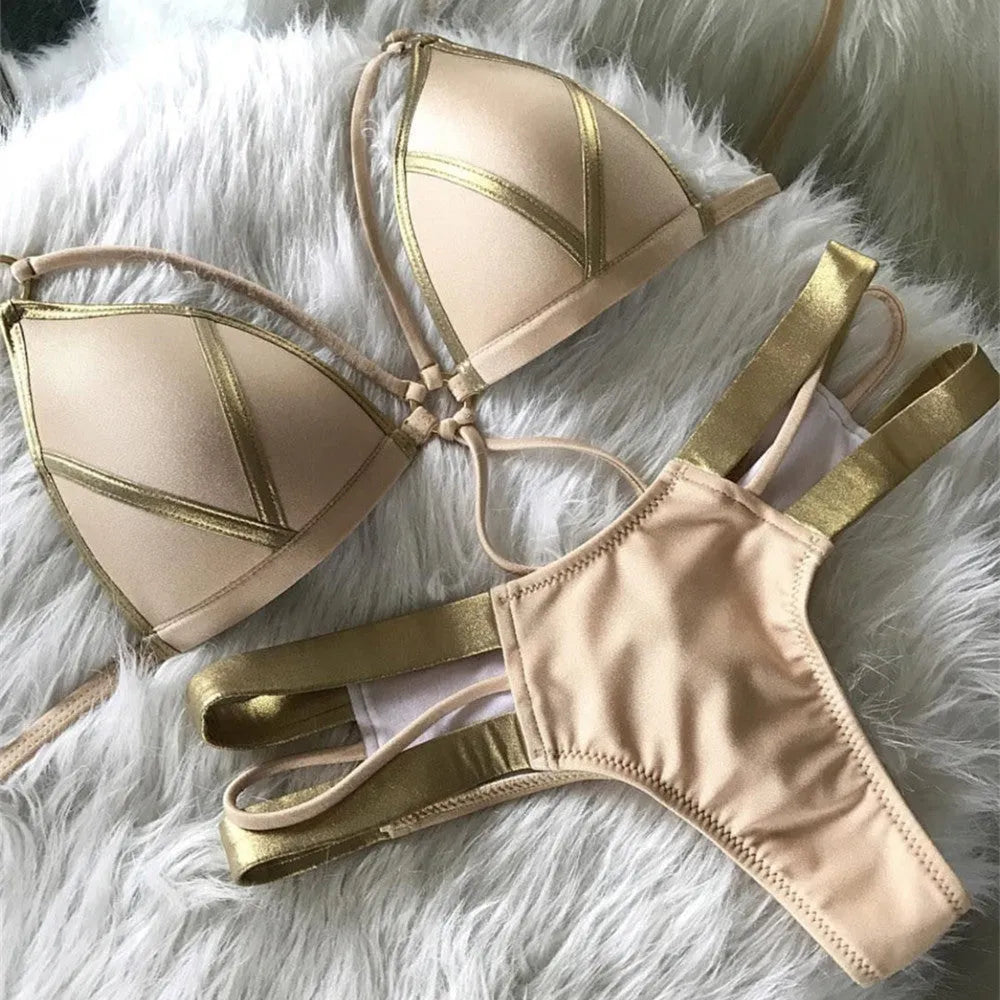 Women's bronzing bikini top and bottom set on a mannequin, showing adjustable straps.