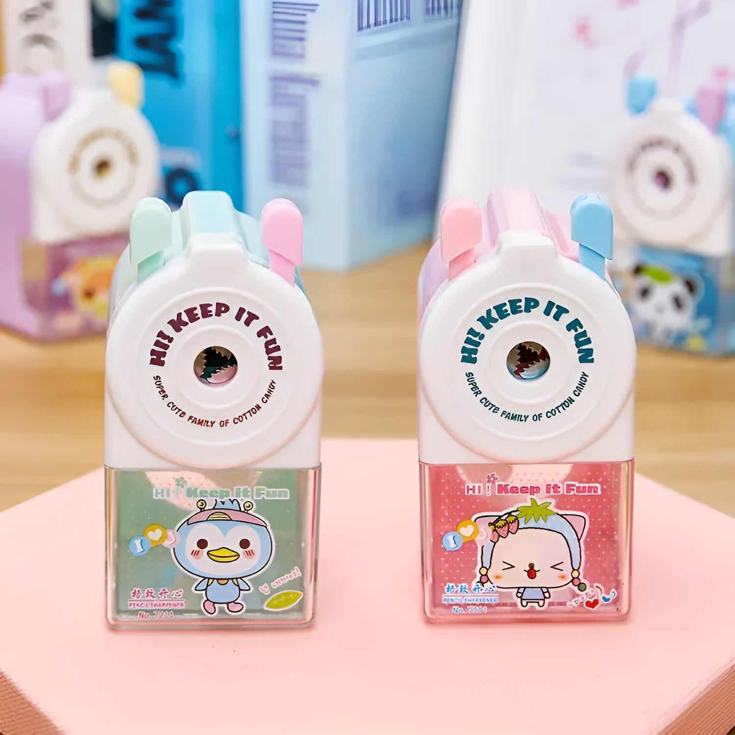 Cartoon pet geometric pencil sharpener in blue green pink purple colours 88mm high