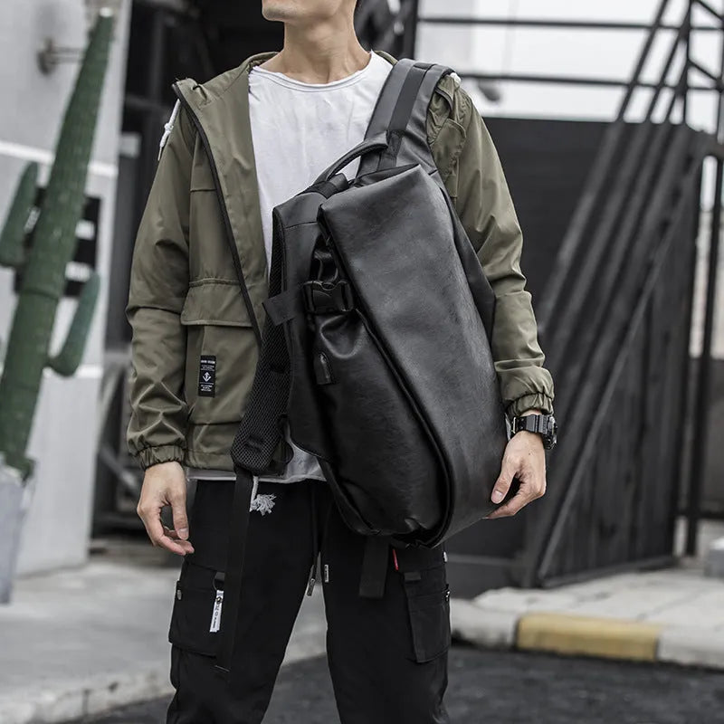 Black PU leather men's shoulder bag with square shape, car suture detail, and double straps