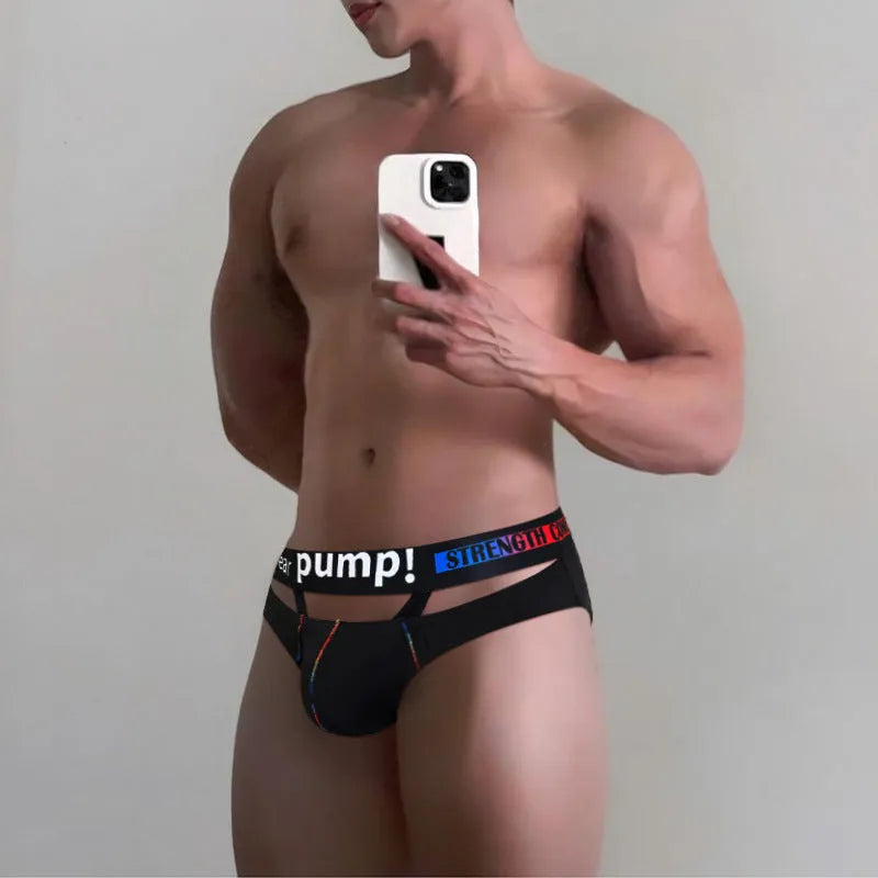 Men's solid black modal low waist briefs laid flat, showing the briefs style.