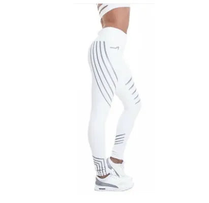 Women's black high-waisted workout leggings with night glowing print pattern on legs