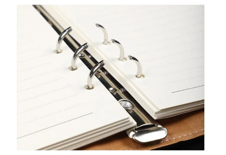 A5 leather buckle notebook with 6-hole clip in multiple colours showing hard cover and closure
