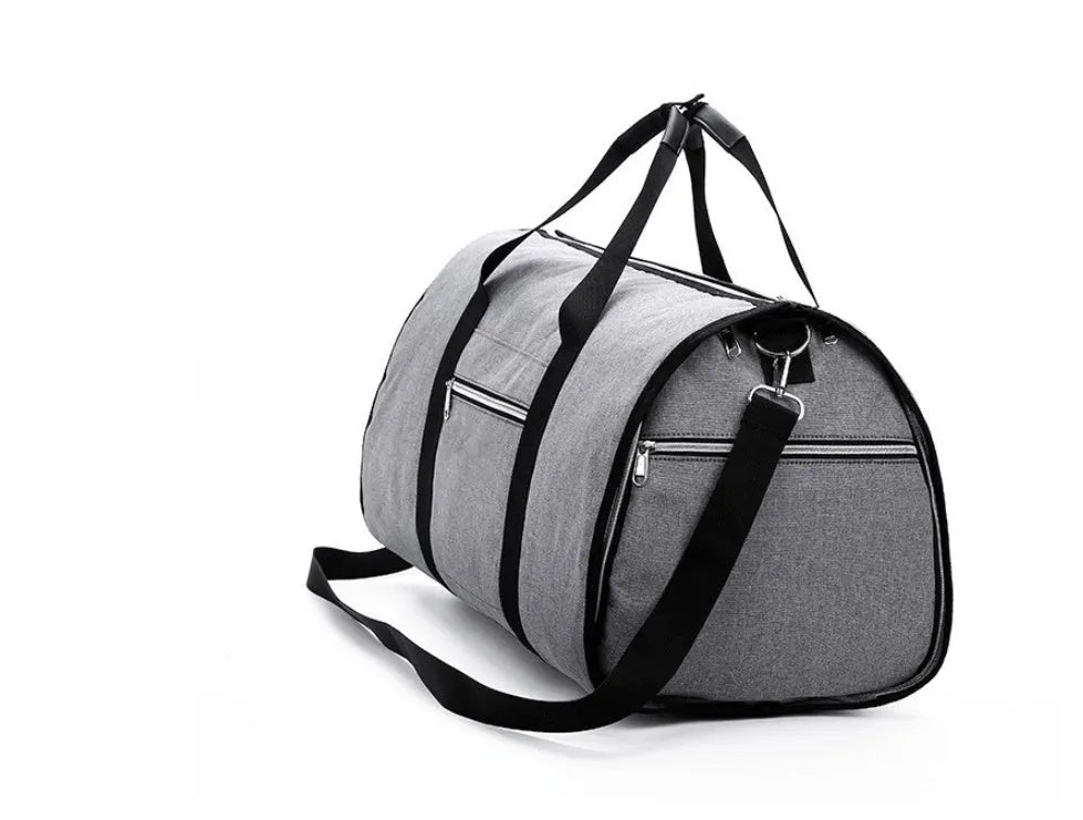 Medium cylinder travel bag in black showing zipper opening and cylindrical shape.