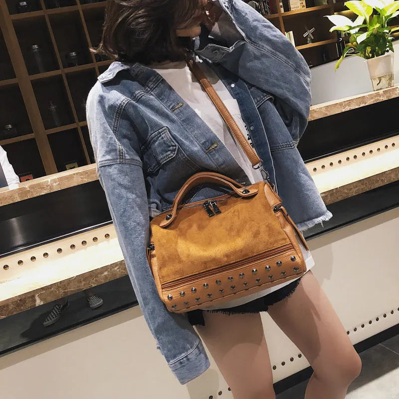 Large casual women's tote shoulder bag in soft PU leather with a zip closure.