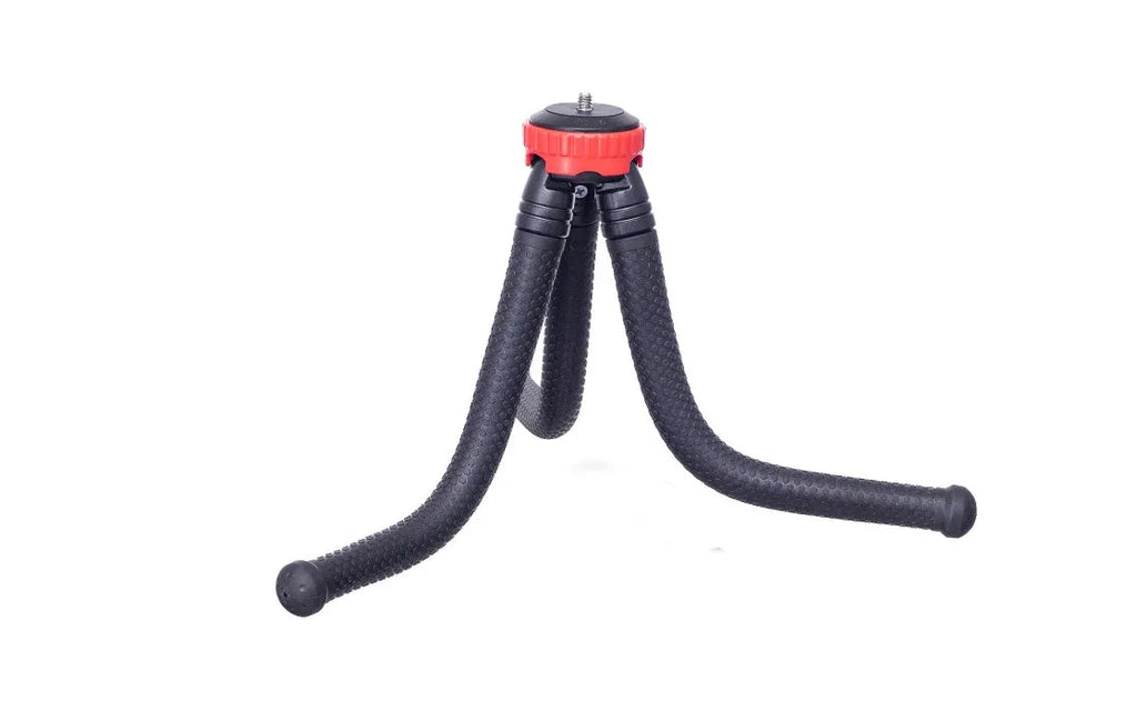 Black octopus tripod with spherical gimbal head wrapped around pole supporting mobile phone