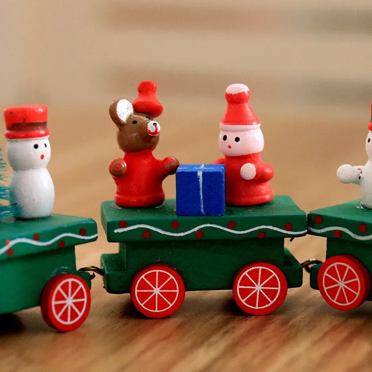 Set of four mini wood train toys in red white and green with painted passengers for shelf display