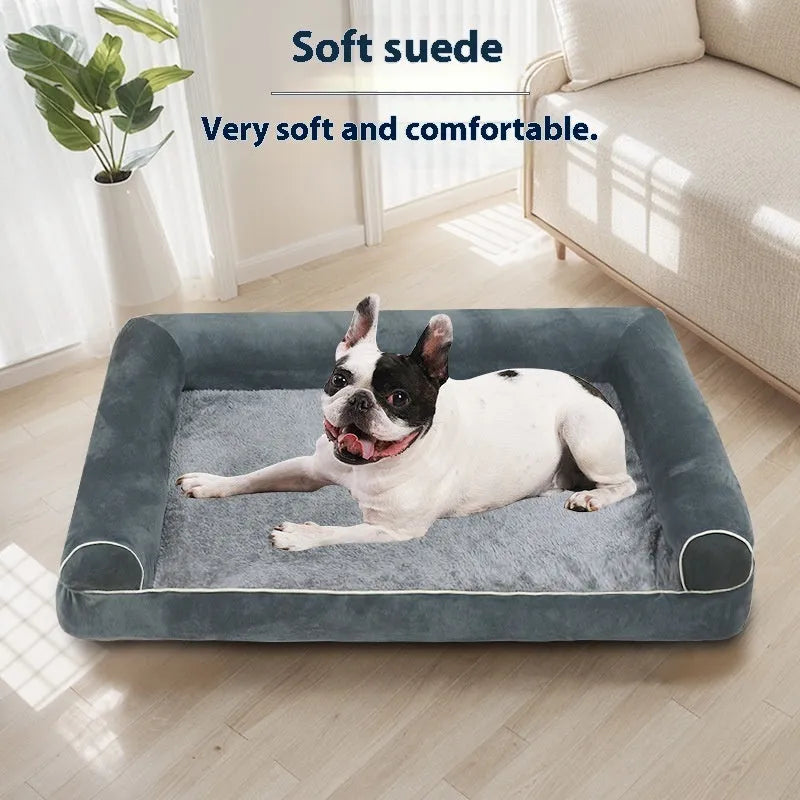 Square sponge dog bed in blue cloth, showing its raised breathable design on a wooden floor.