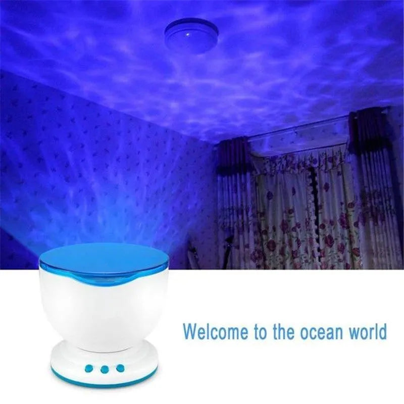 White and blue ocean wave projector LED night light with remote control, measuring 13x12x12 cm