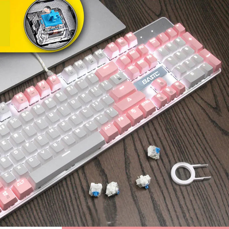 Pink mechanical keyboard with 104 keys including numeric keypad, showing green/black/red switch options