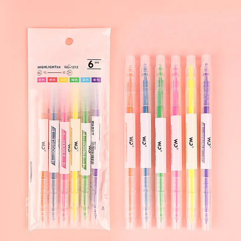 Six double-headed marker pens showing round and oblique nibs in assorted colours including orange, purple, yellow, green, blue, and pink