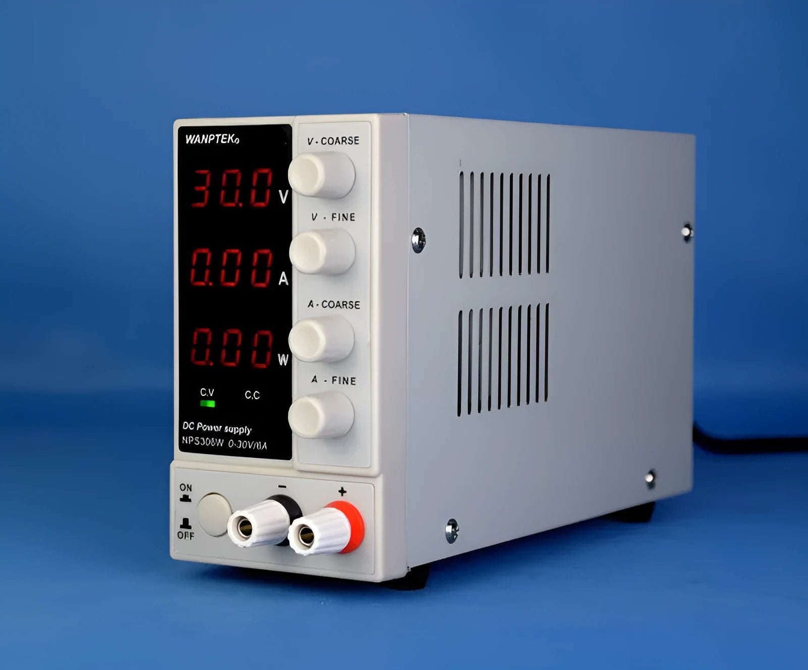 White S605W adjustable DC laboratory bench power supply unit with voltage and current dials.