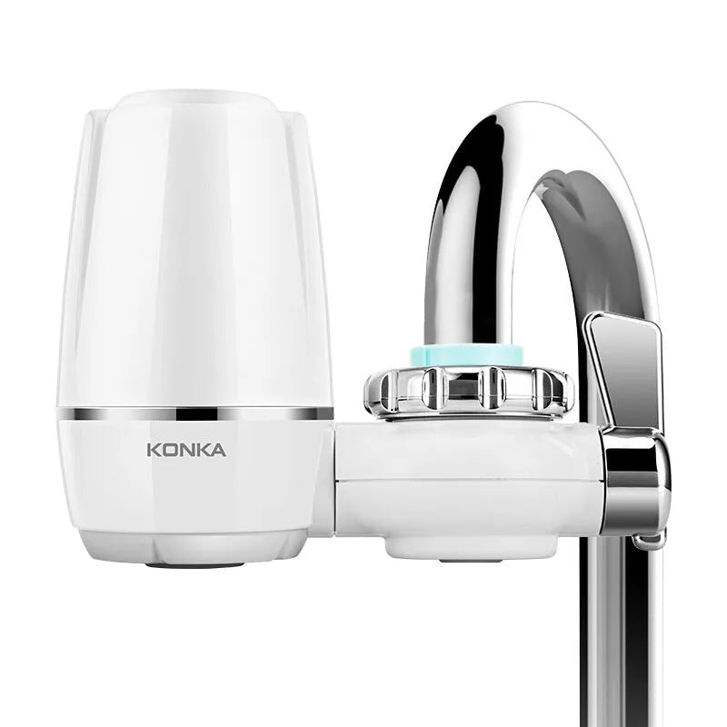 White plastic faucet water filter with ceramic cartridge and universal adapters for kitchen tap installation