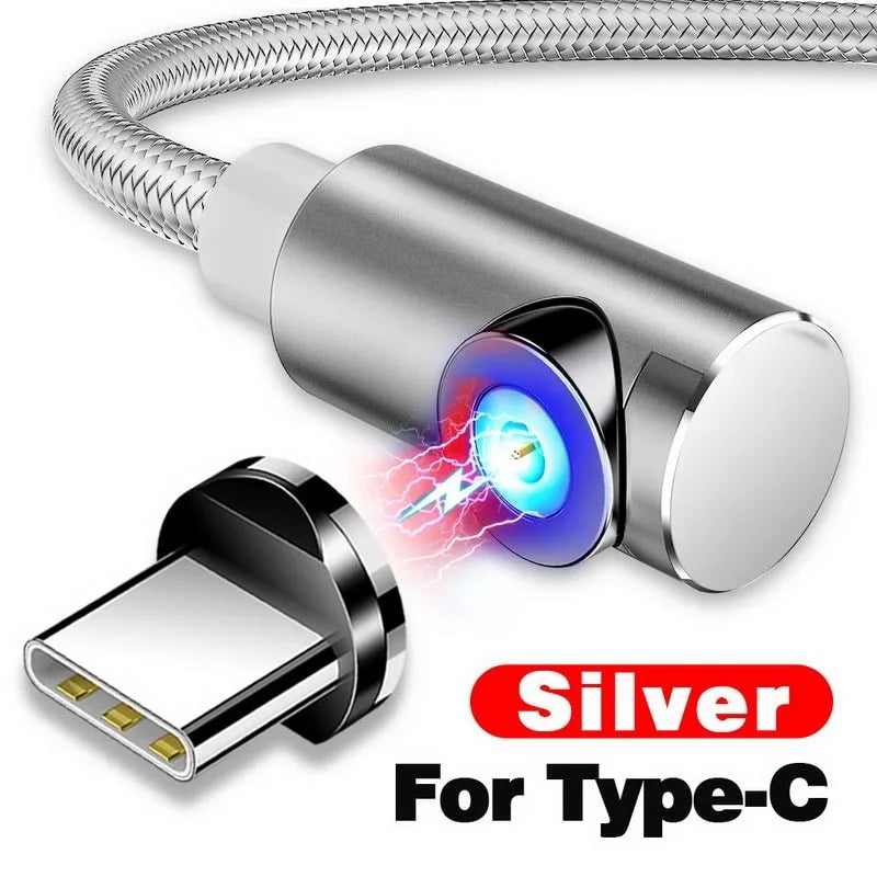 Black aluminium alloy magnetic charging cable with L-shaped plug on a wooden table.