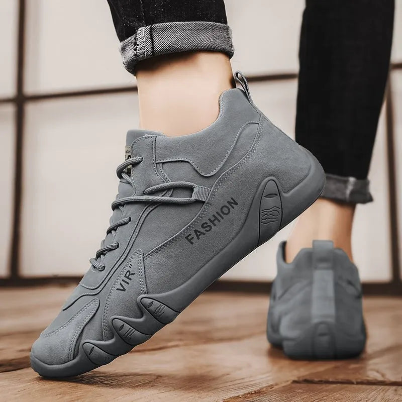 Men's grey low-top casual shoes with synthetic leather upper, round toe, and elastic band closure.