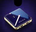 Blue mini power bank showing 20000mAh capacity and multi USB ports on a compact body