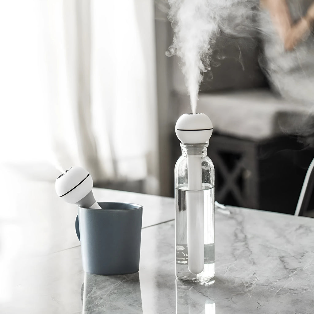Columnar magic wand ultrasonic humidifier with 1 litre tank for rooms under 10 square metres