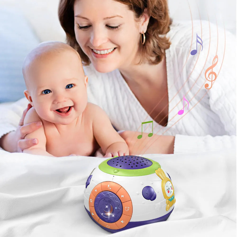 White plastic starry sky night light projector for children with control button on top.