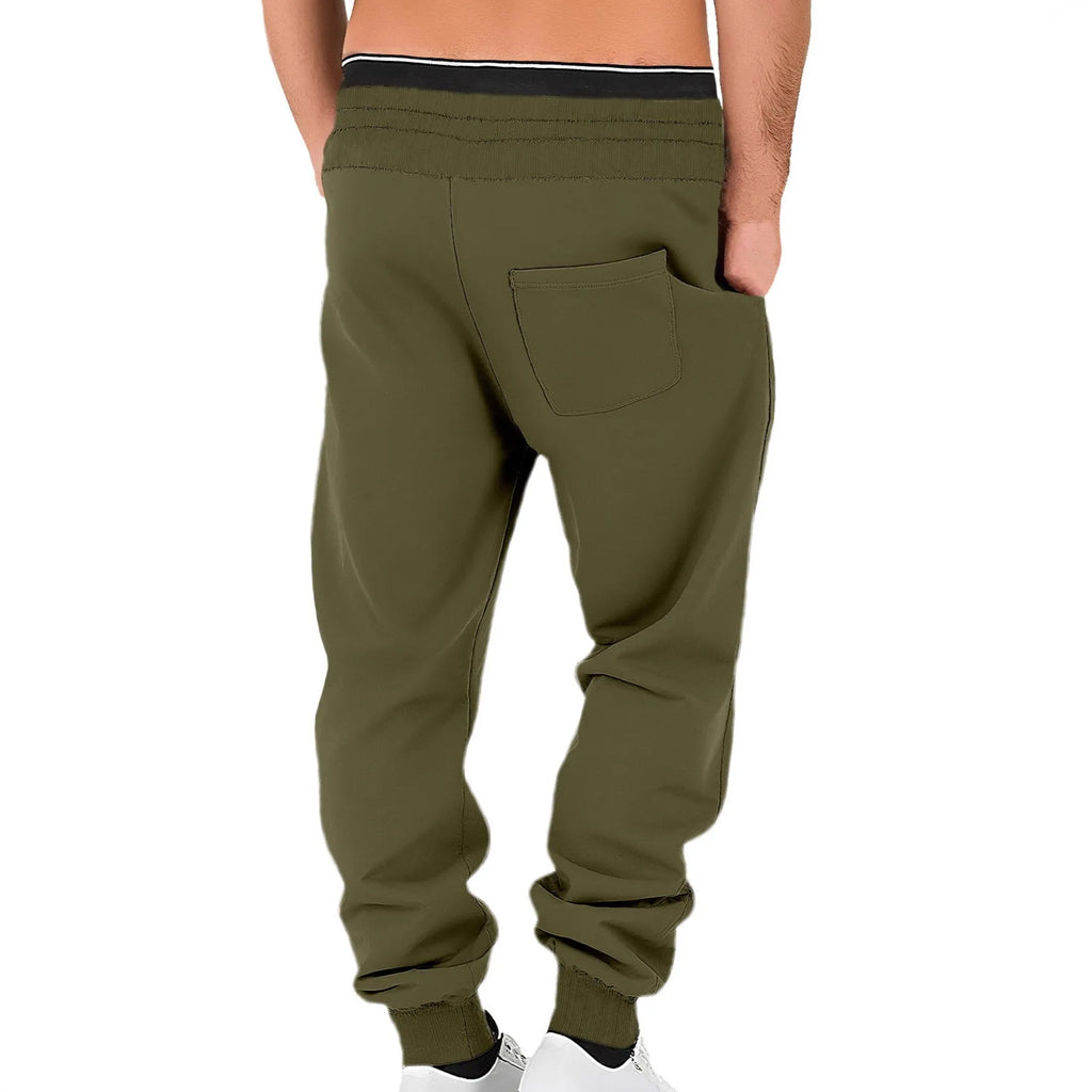 Men's solid colour fleece-lined cuffed sweatpants in army green with drawstring waist