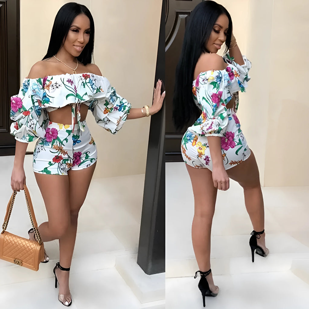Women's multicolour digital print pyjama set with a short top featuring fluffy long sleeves and matching shorts.