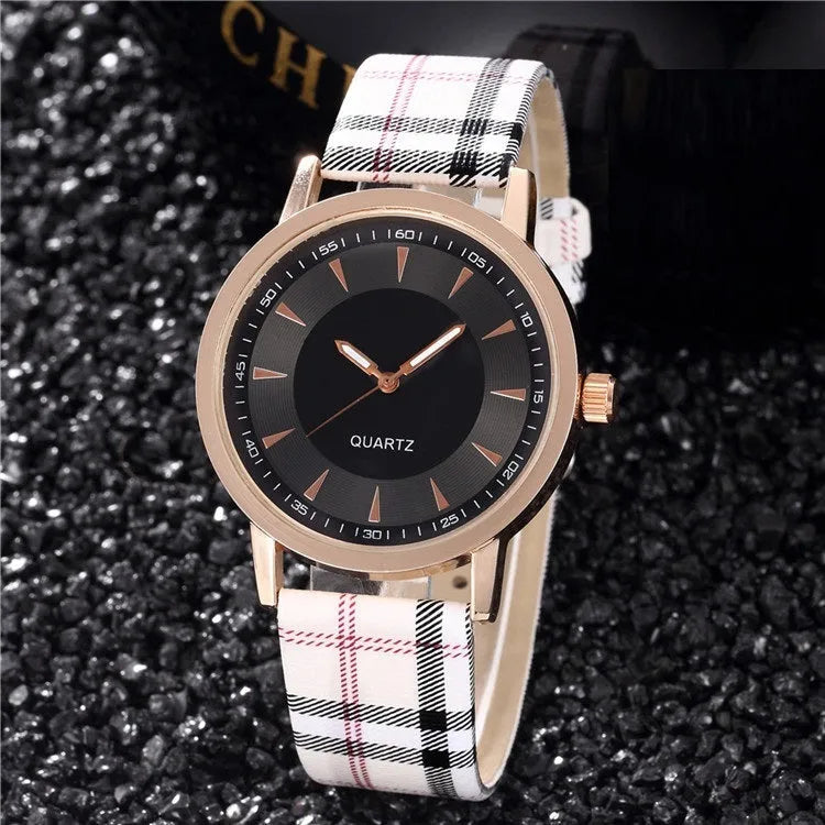 Women's fashion belt watch with round dial, leather strap, gold black colour, stainless steel case