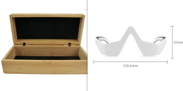 3D micro-current eye massager with glasses design on a pink background.