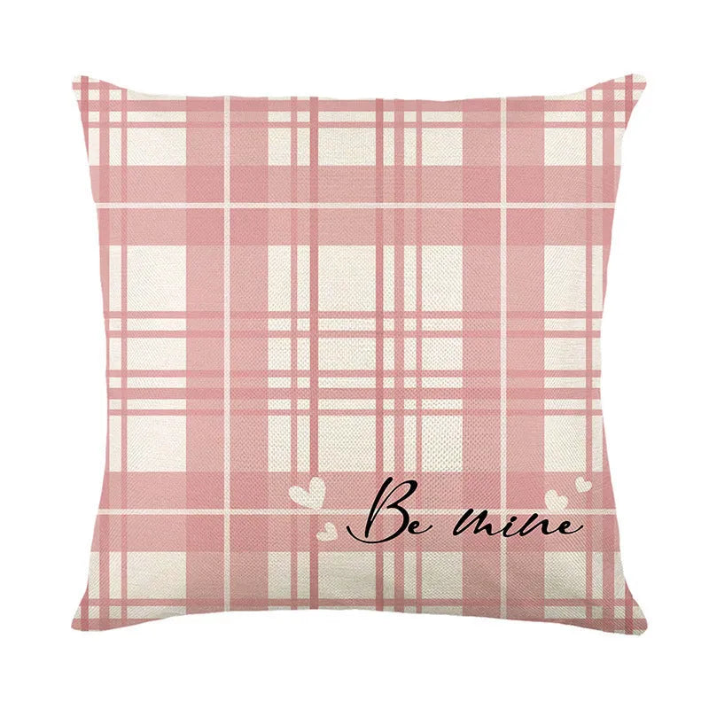 Square red and white plaid heart print pillow cover for Valentine's Day decor.