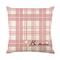 Square red and white plaid heart print pillow cover for Valentine's Day decor.