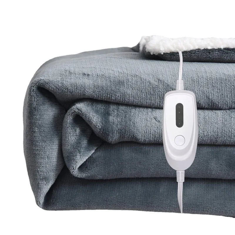 Grey USB electric heating blanket with temperature controls on soft flannel fabric.