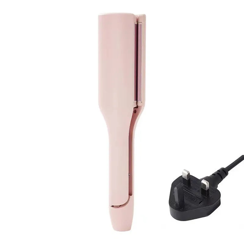 32mm pink hair curling iron with ceramic barrel and 4 heat settings on white background