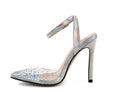 Women's pointed-toe stiletto sandals with a diamond detail on the PVC upper.