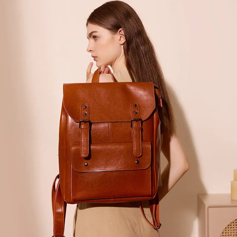 Genuine leather women's computer backpack in black, brown, or coffee brown colours.