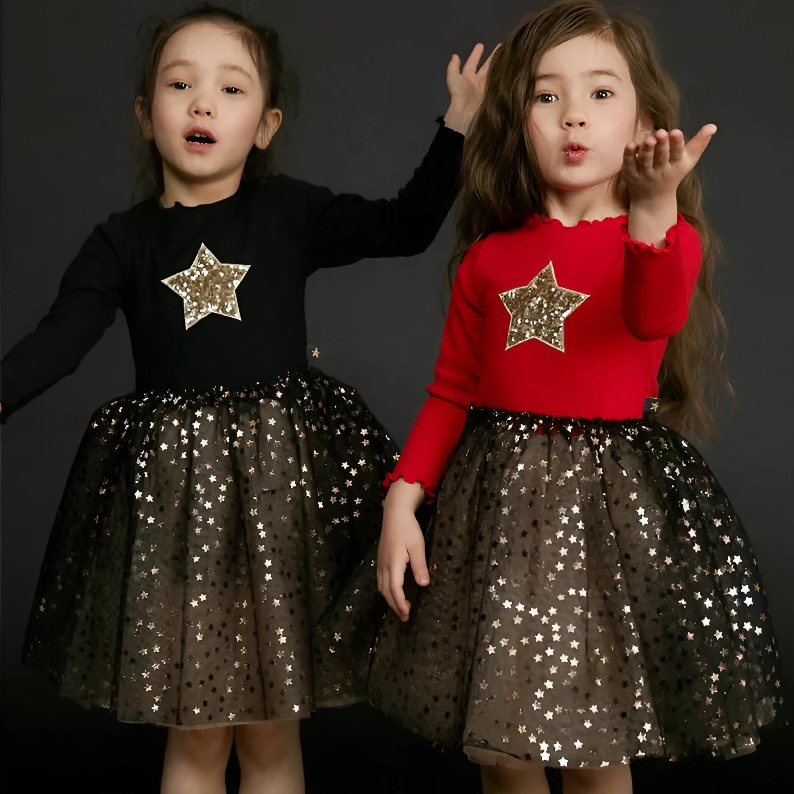 Girls red Christmas dress with long sleeves, princess skirt, and embroidered star details