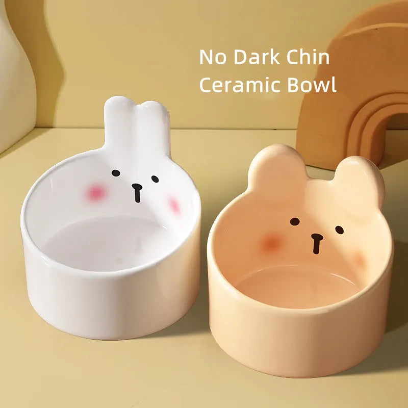 Ceramic pet feeding bowls with neck protection design in white and yellow colours