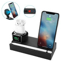 Black eight-in-one desktop charging station with five USB ports and a square wireless charging panel.