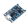 Small blue PCB for lithium battery charging and protection, showing component layout.