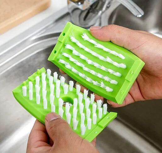 Kitchen cleaning brush with knife fork chopstick scrubbers and suction cup base in blue green pink colours