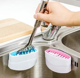 Kitchen cleaning brush with knife fork chopstick scrubbers and suction cup base in blue green pink colours