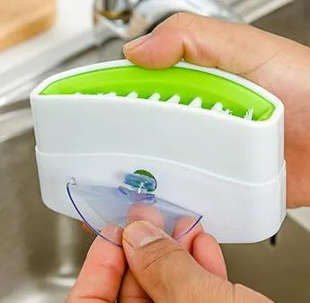 Kitchen cleaning brush with knife fork chopstick scrubbers and suction cup base in blue green pink colours