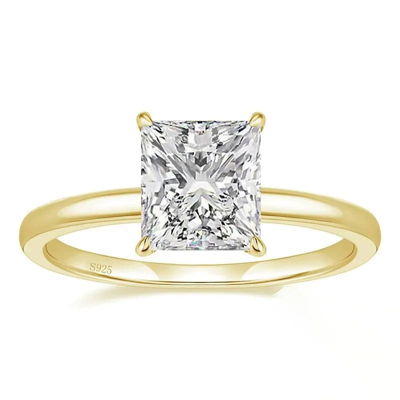A geometric 925 sterling silver ring with a round zirconium detail, shown in silver, gold, and rose gold colour options.