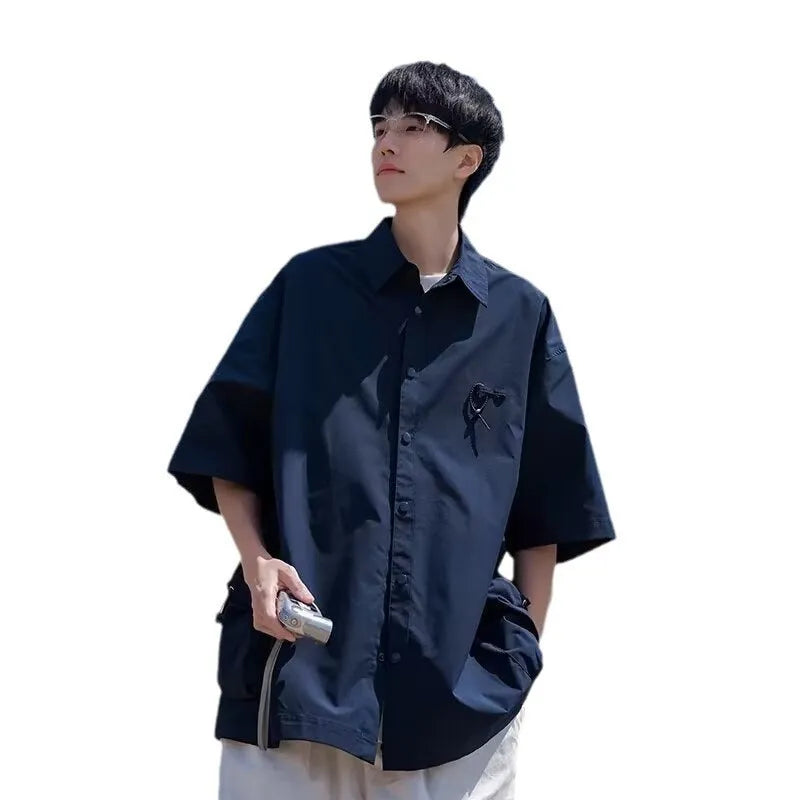 Retro workwear short-sleeved shirt in solid colour with loose fit and cardigan style
