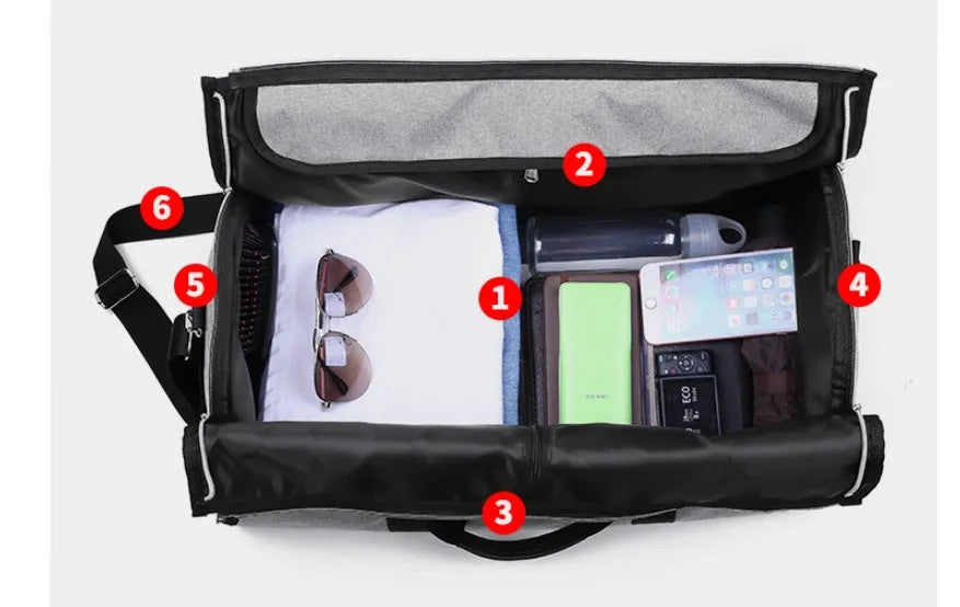 Medium cylinder travel bag in black showing zipper opening and cylindrical shape.