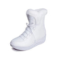 Women's black lace-up winter boots with a platform sole on a white background