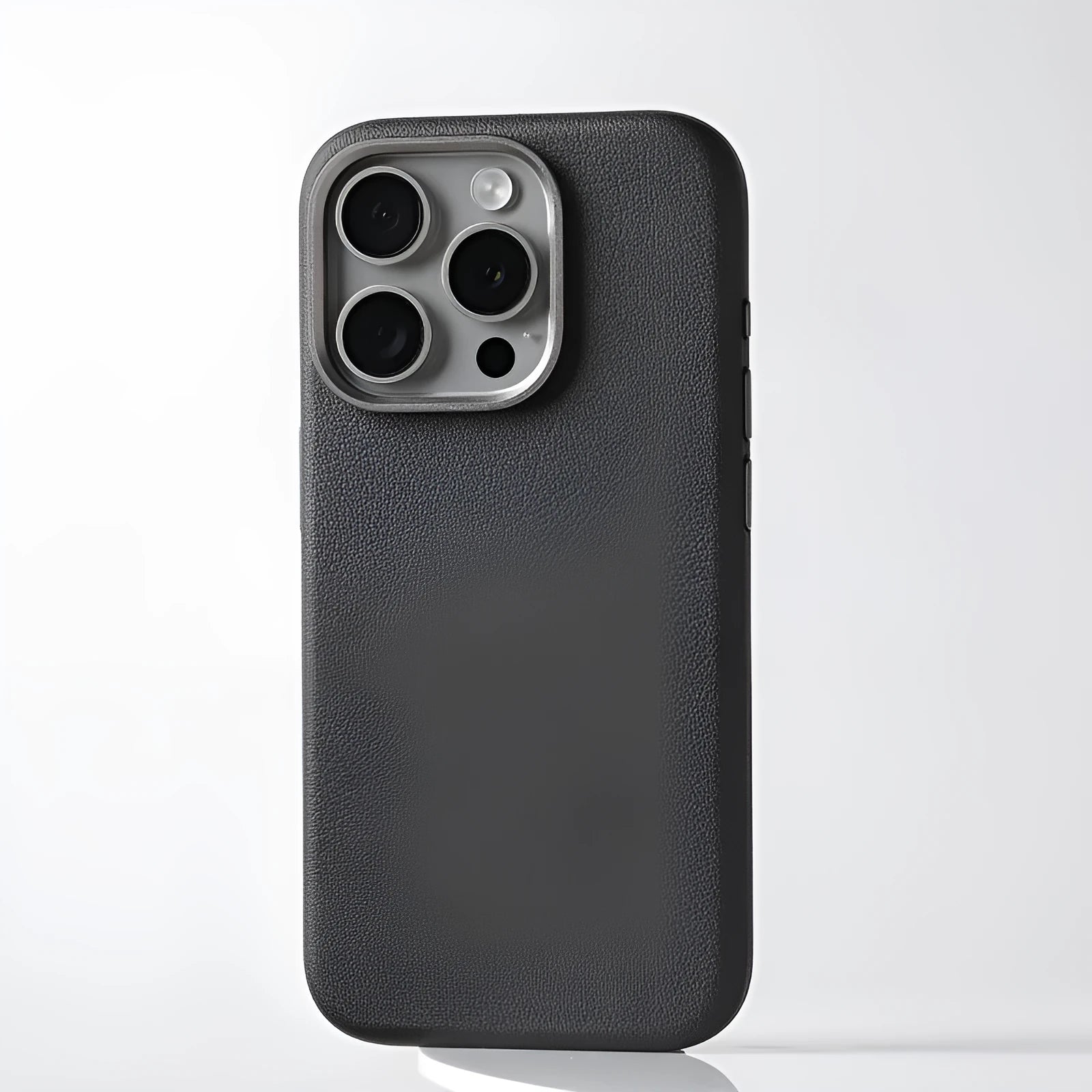 Genuine leather MagSafe compatible protective case for iPhone with metal camera lens guard.