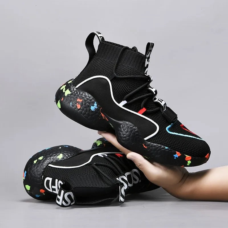 Men's camouflage patterned vulcanised sneakers with mesh upper and flat rubber sole.