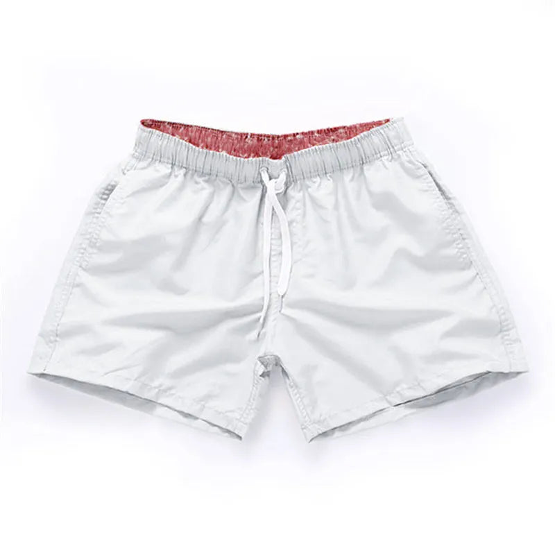 Men's quick-dry polyester beach shorts in straight leg cut available in multiple colours and sizes up to 4XL