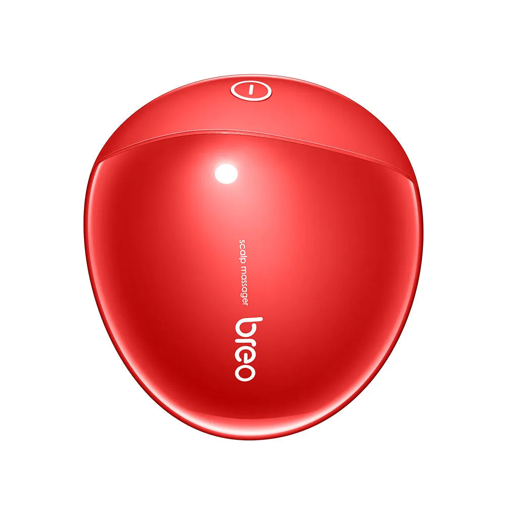 Red handheld electric scalp massager with USB cable connection